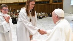 Pope Francis with altar servers in 2022