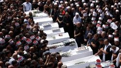 Funeral of children killed by a rocket in Israeli-occupied Golan Heights.