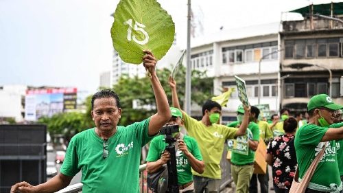 Green Party leader Phongsa Choonaem (left) in an election campaign event in Bangkok.