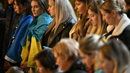 People pray for peace in Ukraine during an inter-faith prayer service at the Ukrainian Catholic Cathedral of the Holy Family in London